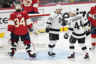 Los Angeles Kings right wing Viktor Arvidsson (33) celebrates with defenseman Mikey Anderson (44) after Arvidsson scored against Florida Panthers goaltender Alex Lyon (34) during the second period of an NHL hockey game, Friday, Jan. 27, 2023, in Sunrise, Fla. (AP Photo/Wilfredo Lee)