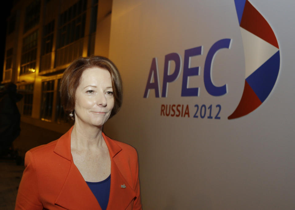 Australian Prime Minister Julia Gillard walks to her car following a press conference at the APEC summit in Vladivostok, Russia, Friday, Sept. 7, 2012. (AP Photo/Mark Baker)