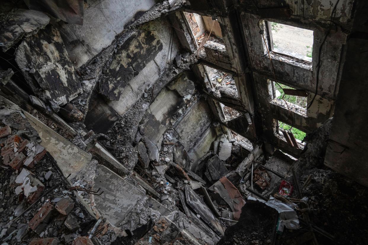 An apartment house destroyed after a Russian attack in Saltivka district in Kharkiv, Ukraine, Tuesday, July 5, 2022. (AP Photo/Evgeniy Maloletka)