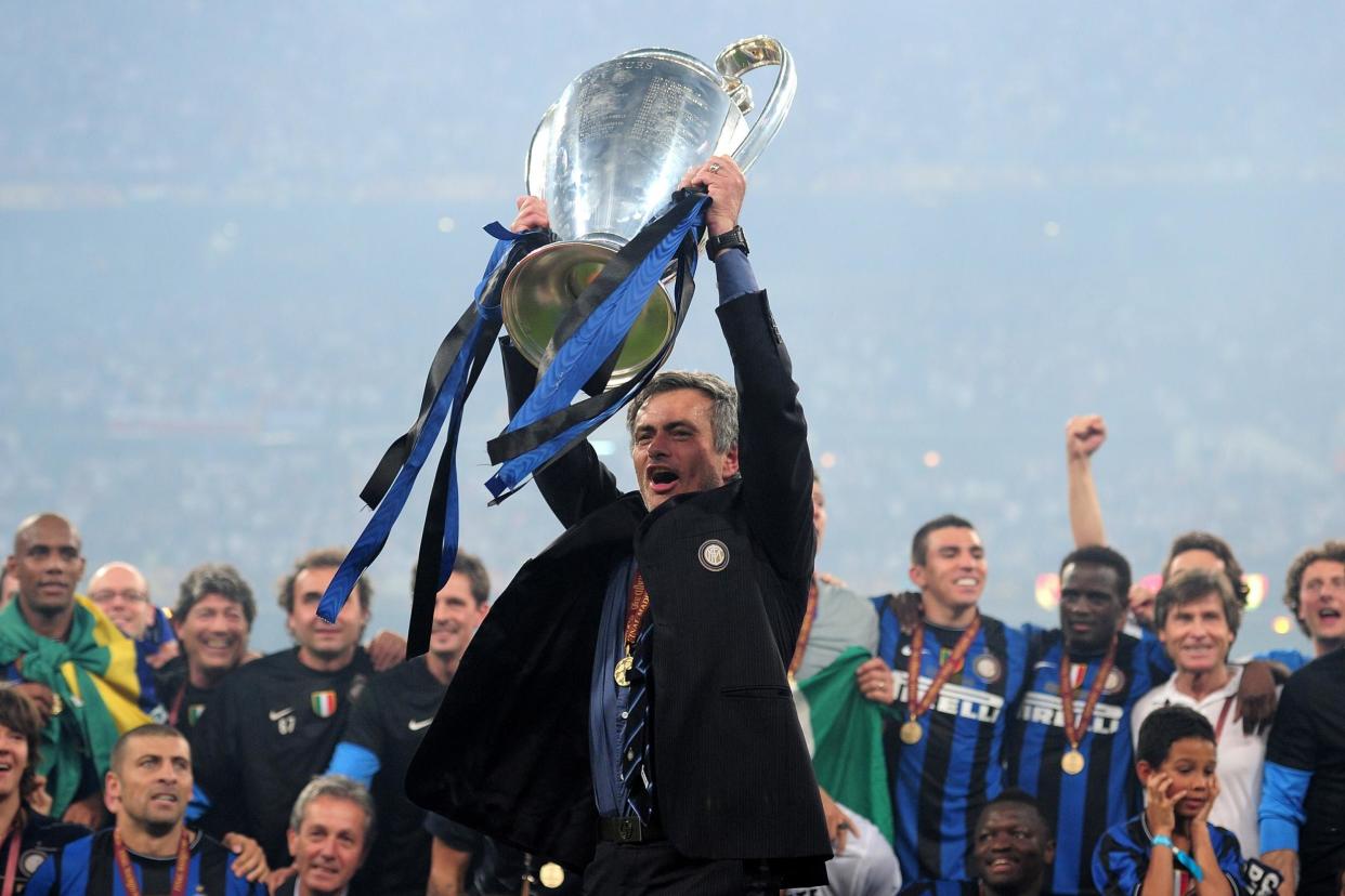 Kings of Europe | Jose Mourinho lifts the Champions League trophy aloft after Inter win their third European Cup in 2010: Shaun Botterill/Getty Images