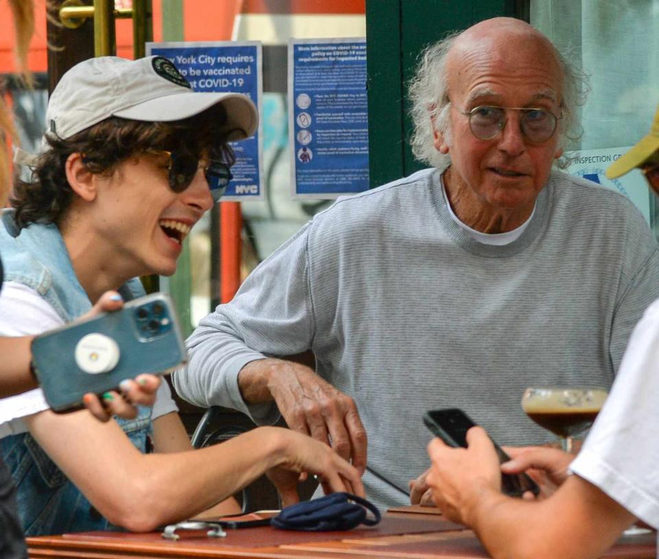 <p>Timothée Chalamet and Larry David enjoy a bite to eat at Sant Ambroeus in N.Y.C. on Sept. 14.</p>