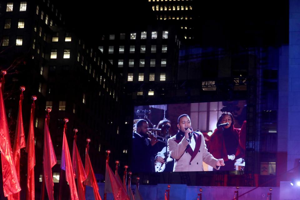 John Legend is projected on to a large screen during the Rockefeller Center Christmas Tree Lighting Ceremony in Manhattan Dec. 4, 2019.