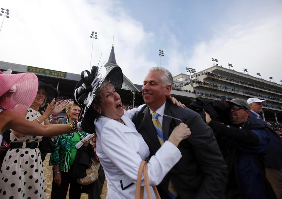 Todd Pletcher (right), trainer of Super Saver, hugs his mom, Jerrie Pletcher, after winning the Kentucky Derby on May 1, 2010.