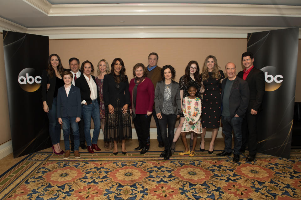 Channing Dungey and Roseanne Barr with cast and executive producers of <em>Roseanne</em> in January. (Photo: Group LA via Getty Images)