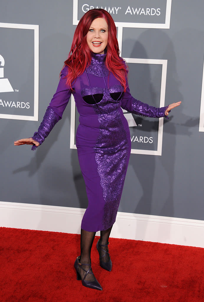 <b>Kate Pierson</b><br> <b>Grade: F</b><br> Remember that woman from the B-52s who used to dance around in wacky outfits to songs like "Love Shack"? Well, the now 64-year-old Kate Pierson is still doing it ... but these days, the looks are less flattering and more frightening. The witchy shoes, sequined purple dress, and shocking pink hair would have been better suited for a costume party than the Grammys!