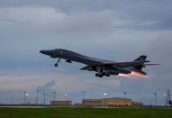 FILE PHOTO: A U.S. Air Force B-1B Lancer assigned to the 37th Expeditionary Bomb Squadron, takes-off to fly a bilateral mission with Japanese and South Korea Air Force jets in the vicinity of the Sea of Japan, from Andersen Air Force Base, Guam, October 10, 2017. Staff Sgt. Joshua Smoot/U.S. Air Force/Handout via REUTERS