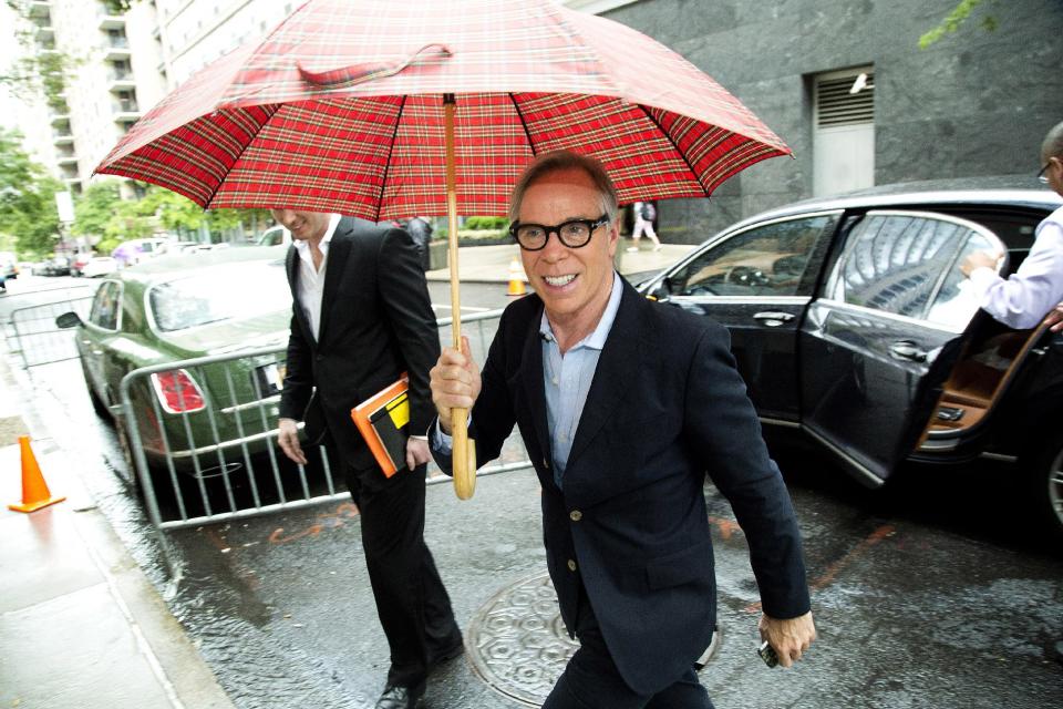 This June 4, 2012 photo shows fashion designer Tommy Hilfiger arriving for rehearsals for the CFDA Awards in New York. Hilfiger has been in the fashion business for more than 40 years, starting at a little denim shop in Elmira, N.Y., and now at the helm of a brand that's one of the most recognizable in the world. This spring, he added “American Idol” style adviser to his resume. His peers at the Council of Fashion Designers of America honored him Monday night with a lifetime achievement award. (AP Photo/Charles Sykes)