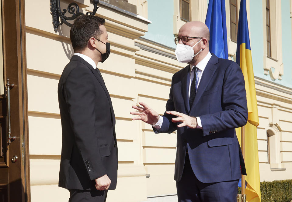 In this photo provided by the Ukrainian Presidential Press Office, Ukrainian President Volodymyr Zelenskiy, left, and European Council President Charles Michel talk as they meet in Kyiv, Ukraine, Wednesday, March 3, 2021. (Ukrainian Presidential Press Office via AP)