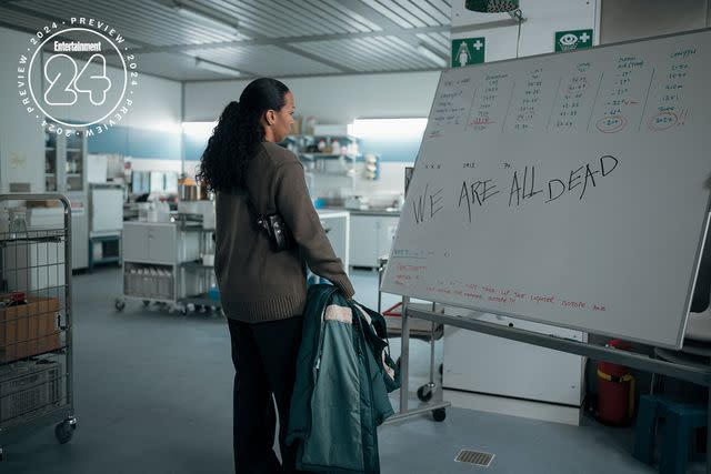 <p>HBO</p> Detective Navarro (Kali Reis) investigates an ominous message left on a whiteboard at the Tsalal Arctic Research Station.