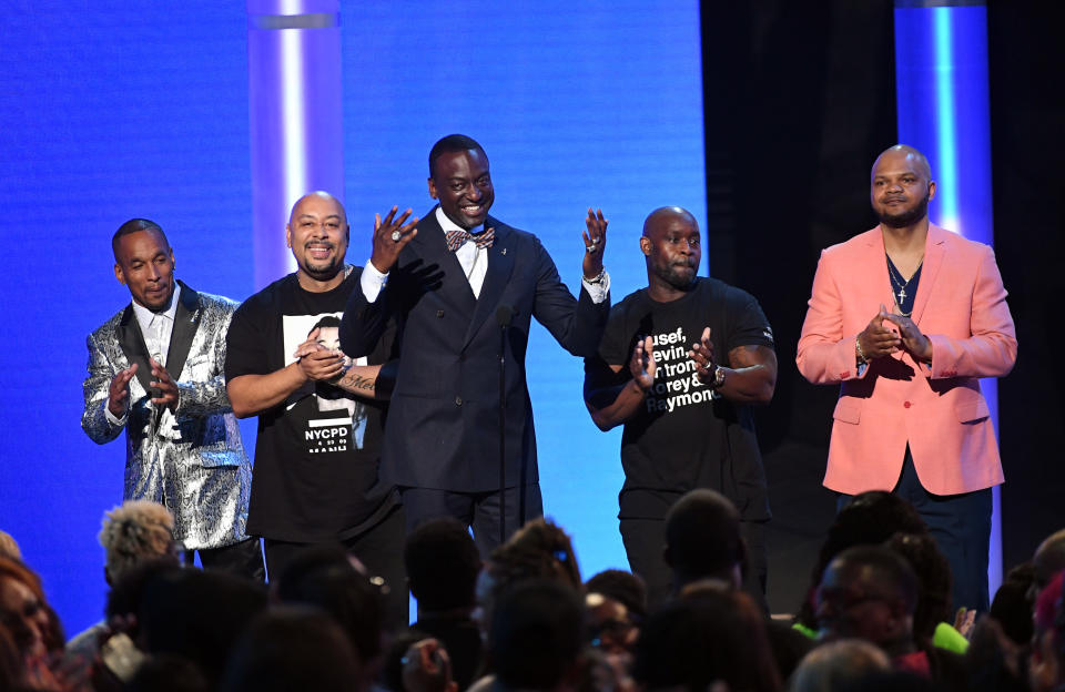 Antron McCray (second to right), Kevin Richardson (right), Raymond Santana (left), Korey Wise (second to left), and Yusef Salaam (middle) (the Exonerated Five) 