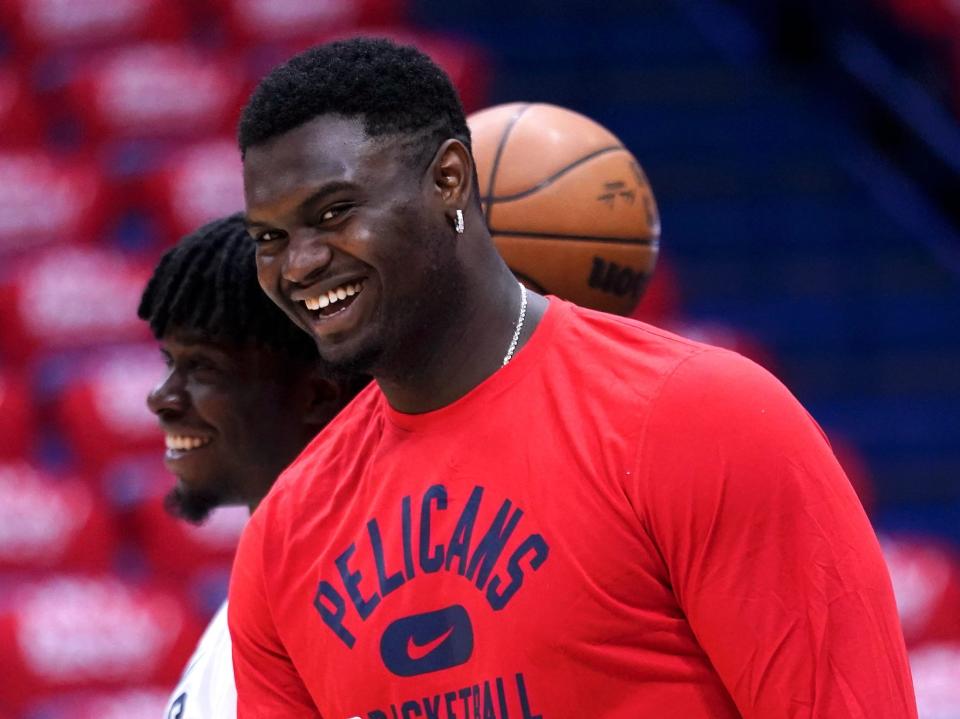 Zion Williams smiles during warmups of a 2022 Pelicans game.