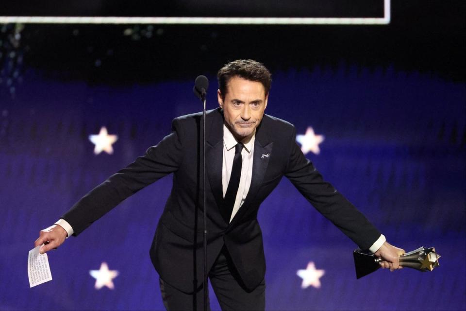Robert Downey Jr accepting his award (REUTERS)