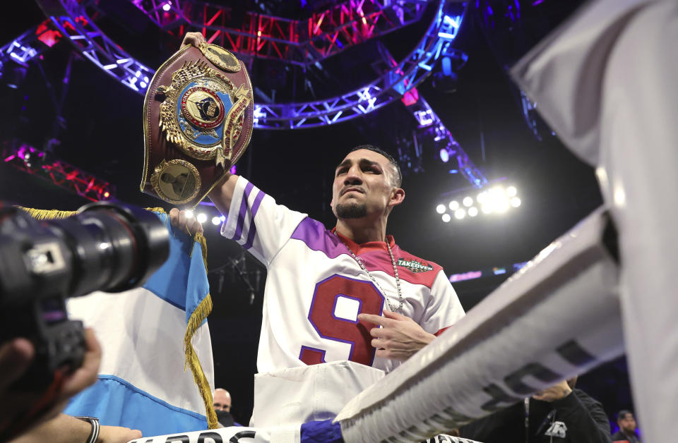 WBO junior welterweight champion Teofimo Lopez celebrates after defeating Jamaine Ortiz in a boxing bout Thursday, Feb. 8, 2024, in Las Vegas. Lopez retained his title with a unanimous decision. (Steve Marcus/Las Vegas Sun via AP)