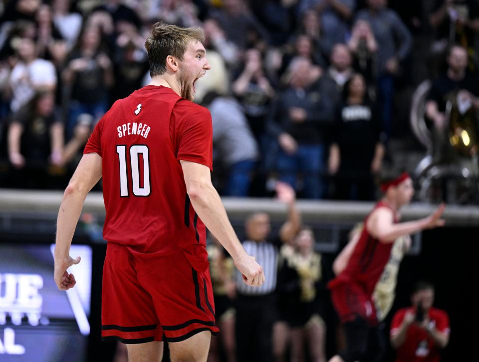 Rutgers Scarlet Knights guard Cam Spencer celebrates after nailing a three-pointer to take the lead late in the game against the Purdue Boilermakers.