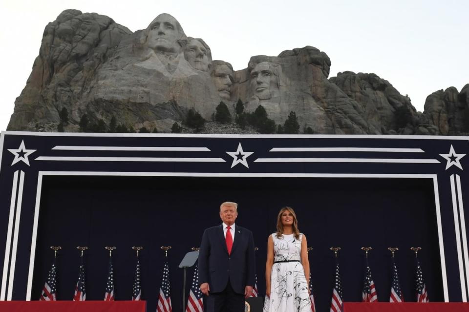 <div class="inline-image__caption"><p>Donald and <span class="caas-xray-inline-tooltip"><span class="caas-xray-inline caas-xray-entity caas-xray-pill rapid-nonanchor-lt" data-entity-id="Melania_Trump" data-ylk="cid:Melania_Trump;pos:3;elmt:wiki;sec:pill-inline-entity;elm:pill-inline-text;itc:1;cat:OfficeHolder;" tabindex="0" aria-haspopup="dialog"><a href="https://search.yahoo.com/search?p=Melania%20Trump" data-i13n="cid:Melania_Trump;pos:3;elmt:wiki;sec:pill-inline-entity;elm:pill-inline-text;itc:1;cat:OfficeHolder;" tabindex="-1" data-ylk="slk:Melania Trump;cid:Melania_Trump;pos:3;elmt:wiki;sec:pill-inline-entity;elm:pill-inline-text;itc:1;cat:OfficeHolder;" class="link ">Melania Trump</a></span></span> at Mount Rushmore on July 3, 2020. </p></div> <div class="inline-image__credit">Saul Loeb/AFP via Getty</div>