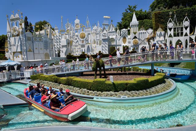 <p>Jeff Gritchen/Digital First Media/Orange County Register via Getty </p> Disneyland visitors on the 'It's a Small World' ride at Disneyland in 2017