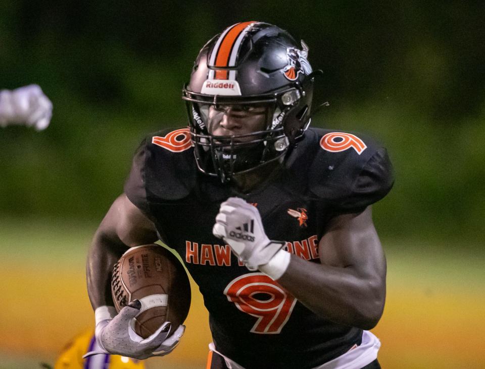 Hawthorne Hornets running back Keenon Johnson (9) runs as the Hawthorne Hornets takes on the Union County Fightin’ Tigers at Hawthorne High School in Hawthorne, FL on Friday, October 13, 2023. [Alan Youngblood/Gainesville Sun]