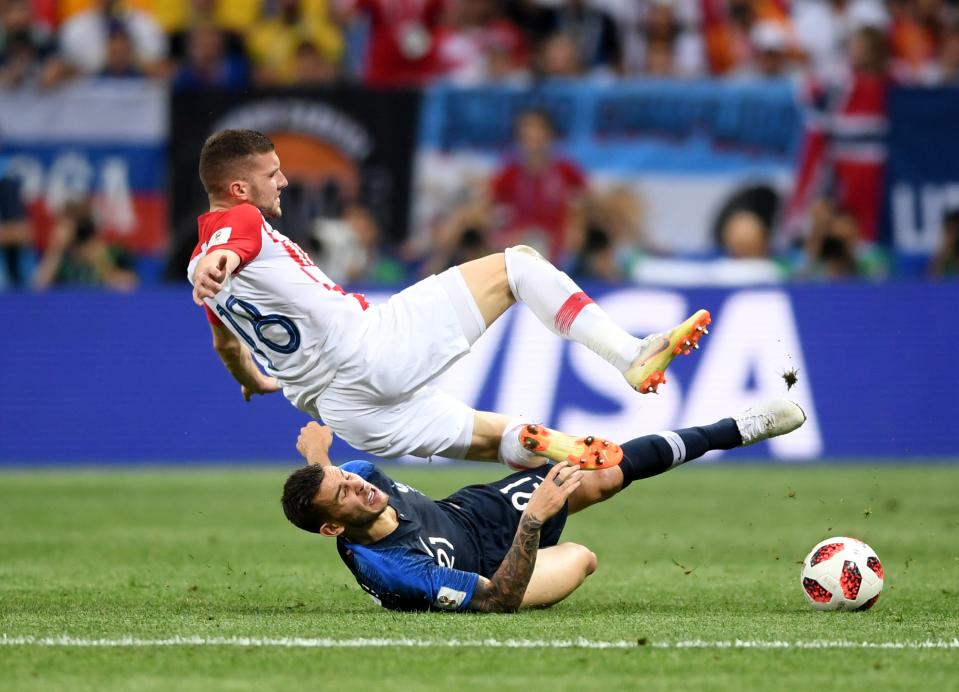 <p>Lucas Hernandez of France tackles Ante Rebic of Croatia. (Photo by Laurence Griffiths/Getty Images) </p>