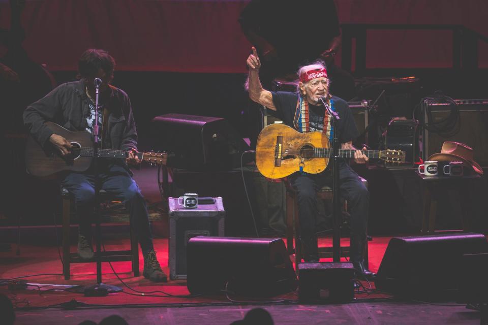 Micah Nelson (left) and Willie Nelson perform at the Outlaw Music Festival on Sunday, Aug. 6, at the PNC Bank Arts Center in Holmdel.