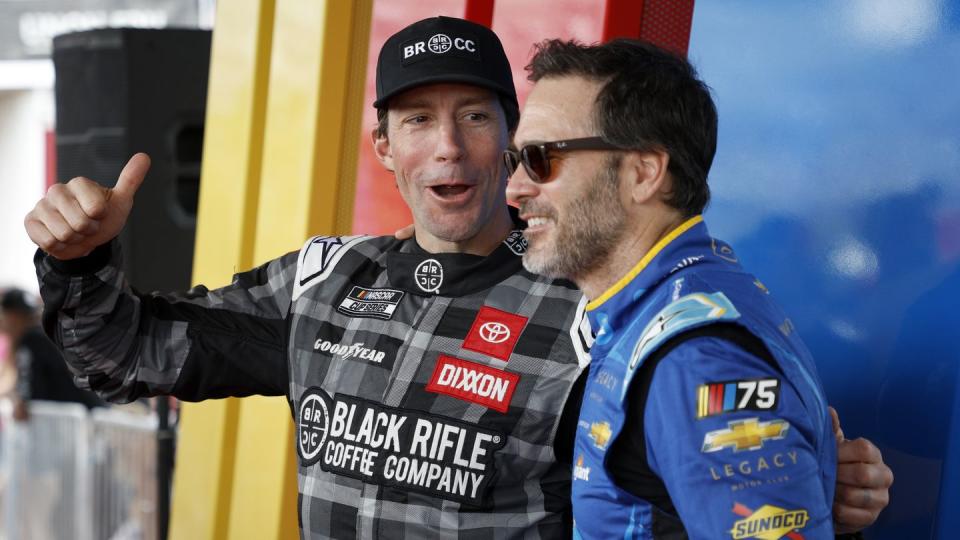 travis pastrana and jimmie johnson pose together at nascar cup series 65th annual daytona 500