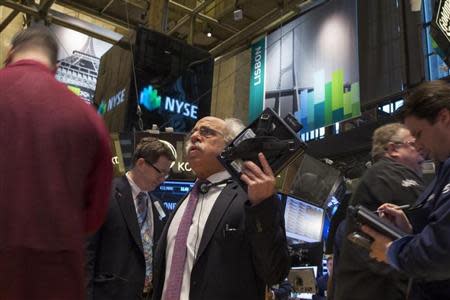 Traders work on the floor of the New York Stock Exchange (NYSE) February 10, 2014. REUTERS/Brendan McDermid