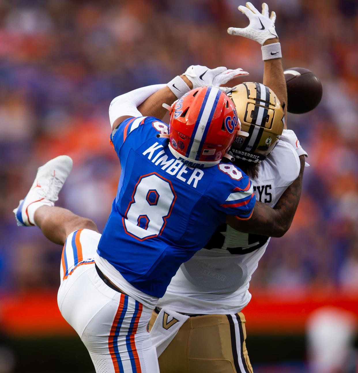 Florida Gators cornerback Jalen Kimber (8) breaks up a pass intended for Vanderbilt Commodores wide receiver London Humphreys (83) at Steve Spurrier Field at Ben Hill Griffin Stadium in Gainesville, FL on Saturday, October 7, 2023. [Doug Engle/Gainesville Sun]