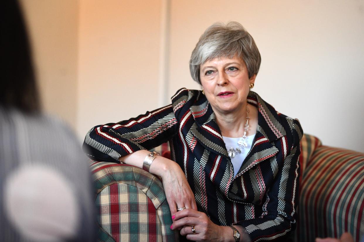 Prime Minister Theresa May talks with case workers and domestic violence survivors at Advance Charity offices in West London where she discussed support for victims of domestic violence.