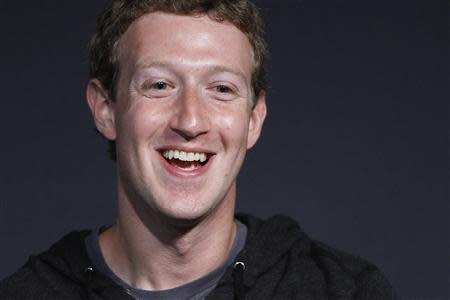 Facebook CEO Mark Zuckerberg smiles in an onstage interview for the Atlantic Magazine in Washington, September 18, 2013. REUTERS/Jonathan Ernst