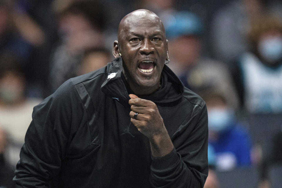 FILE - Michael Jordan looks on during the first half of an NBA basketball game between the Charlotte Hornets and the New York Knicks in Charlotte, N.C., Friday, Nov. 12, 2021. Michael Jordan is finalizing a deal to sell the majority share of the Charlotte Hornets, a move that will end his 13-year run overseeing the organization, the team announced Friday, June 16, 2023. Jordan is selling to a group led by Gabe Plotkin and Rick Schnall, the Hornets said. (AP Photo/Jacob Kupferman, File)