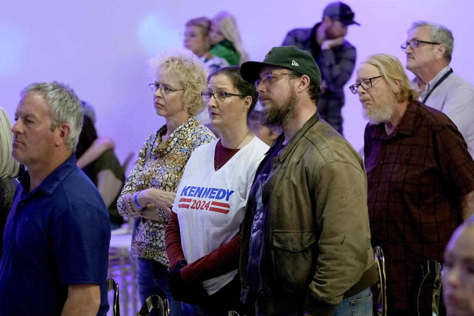 Voters listen to Independent presidential candidate Robert F. Kennedy Jr. speak during a voter rally, Wednesday, Dec. 20, 2023, in Phoenix. (AP Photo/Matt York)