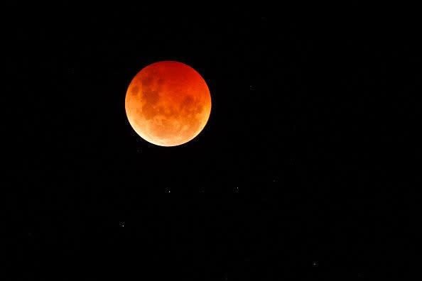 The 'Blood Moon' or lunar eclipse is seen from Williamstown on November 8, 2022, in Melbourne, Australia.