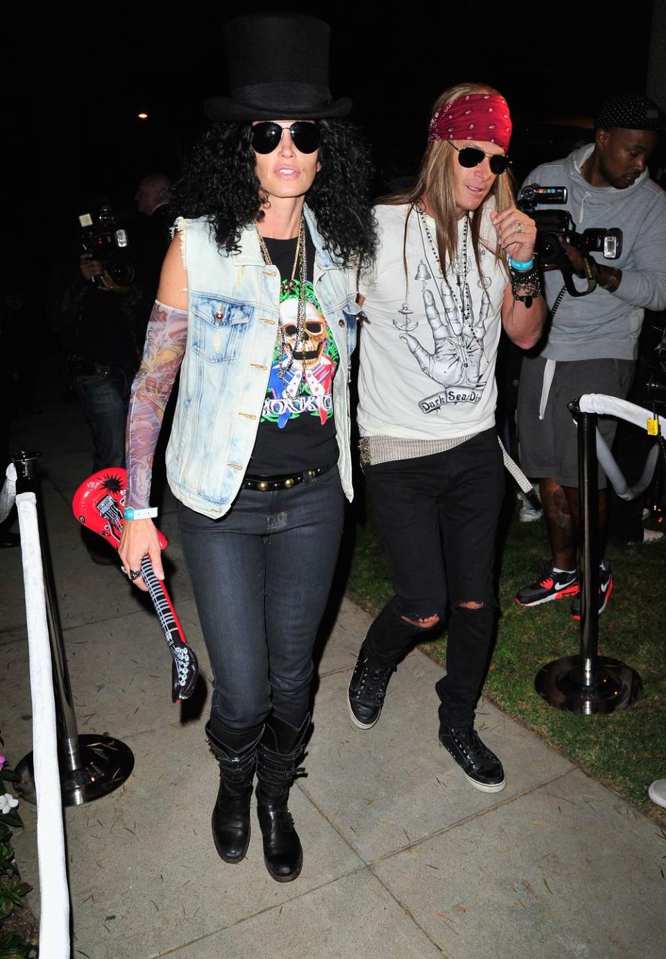 <p>Kaia's parents are just as cool, giving guests a Guns N' Roses reunion as Slash and Axl Rose in 2013 at the Casamigos Halloween Party. </p>