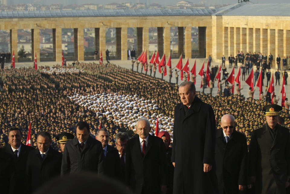 FILE - Turkey's President Recep Tayyip Erdogan visits the mausoleum of the nation's founding father Mustafa Kemal Ataturk, during a ceremony to mark the 79th anniversary of his death, in Ankara, Turkey, on Nov. 10, 2017. Erdogan, who is seeking a third term in office as president in elections in May, marks 20 years in office on Tuesday, March 14, 2023. (AP Photo/Ali Unal, File)