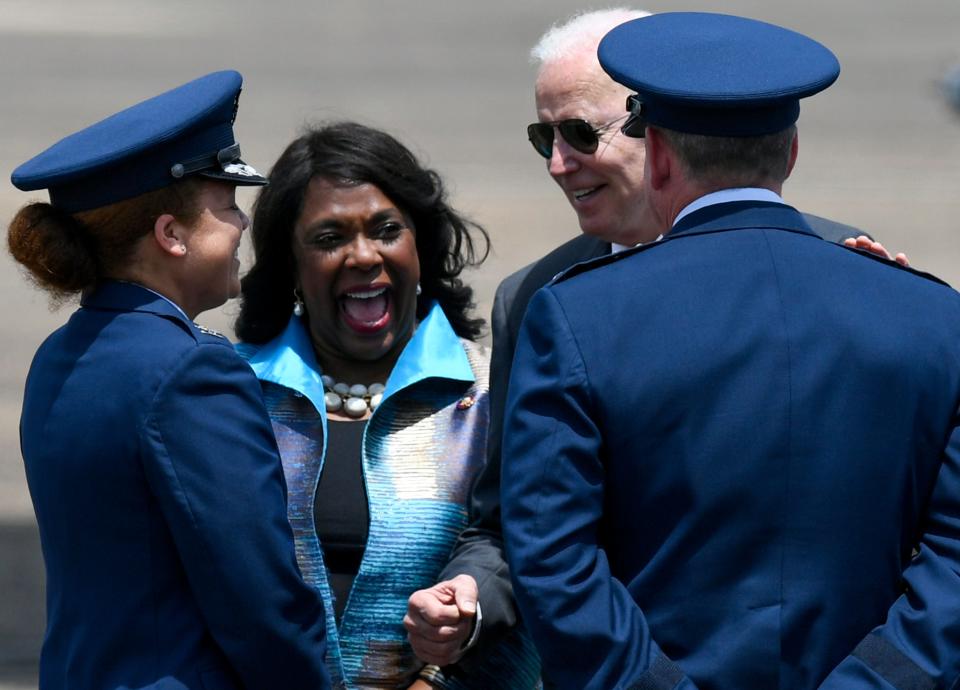 President Joe Biden talks with, from left, Col. Eries Mentzer, 42nd AirBase Wing Commander, U.S, Rep. Terry Sewell and Lt. Gen. James Hecker, Air University Commander and President, as he arrives on Air Force One at Maxwell Air Force Base in Montgomery, Ala., on his way to visit the Lockheed Martin facility in Troy, Ala., on Tuesday May 3, 2022.