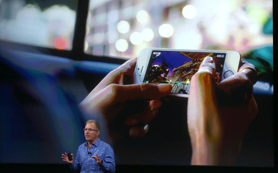 Apple VP Greg Joswiak announces the new iPhone SE during an Apple special event at the Apple headquarters on March 21, 2016 in Cupertino, California: Justin Sullivan/Getty Images