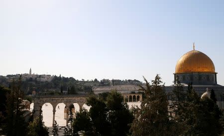 Israeli policemen secure the scene of the shooting attack at the compound known to Muslims as al-Haram al-Sharif and to Jews as Temple Mount, in Jerusalem's Old City July 14, 2017. REUTERS/Ammar Awad