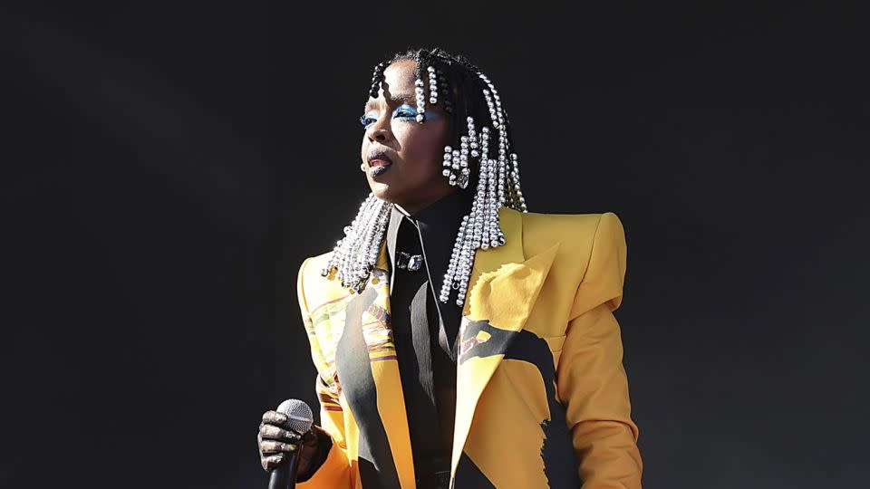 During the festival's first weekend, Lauryn Hill sang in a Balmain suit from the brand's menswear Spring-Summer 2024 collection. - Arturo Holmes/Getty Images for Coachella