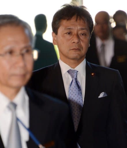 Newly appointed State Minister in charge of Financial services, birthrate and gender equality Ikko Nakatsuka (C) enters the prime minister's official residence in Tokyo, on October 1. Japanese PM Yoshihiko Noda reshuffled his cabinet, in what commentators said was a bid to refloat his sinking popularity and to signal to Beijing his intention to put a territorial row aside