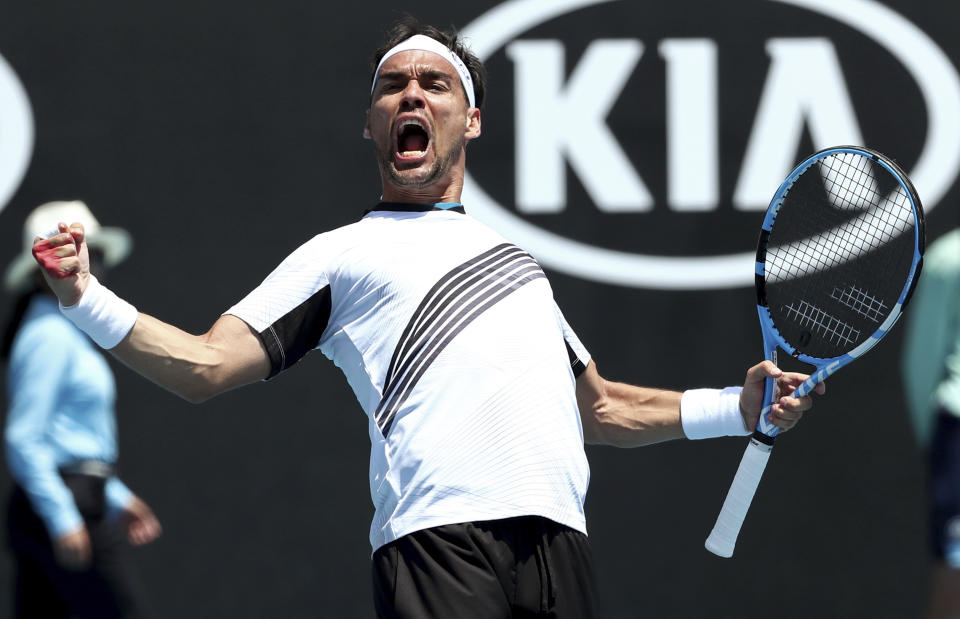 Italy's Fabio Fognini celebrates after defeating Reilly Opelka of the U.S. in their first round singles match at the Australian Open tennis championship in Melbourne, Australia, Tuesday, Jan. 21, 2020. (AP Photo/Dita Alangkara)