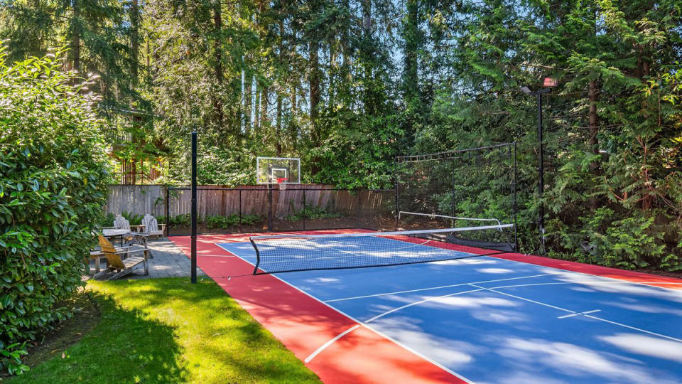 The lighted, full-size sports court accommodates short-court basketball and pickleball.