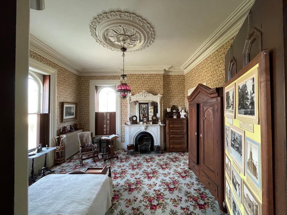 The home includes four rooms on each floor, an upper hall and third floor hall leading to the cupola and a fine view of the city. This is the northwest bedroom on the second floor.