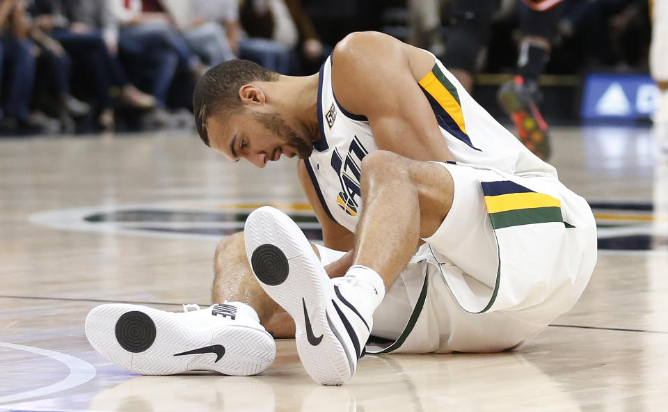 That right leg is going to keep Utah Jazz center Rudy Gobert sidelined for a significant period of time. (AP Photo/Rick Bowmer)