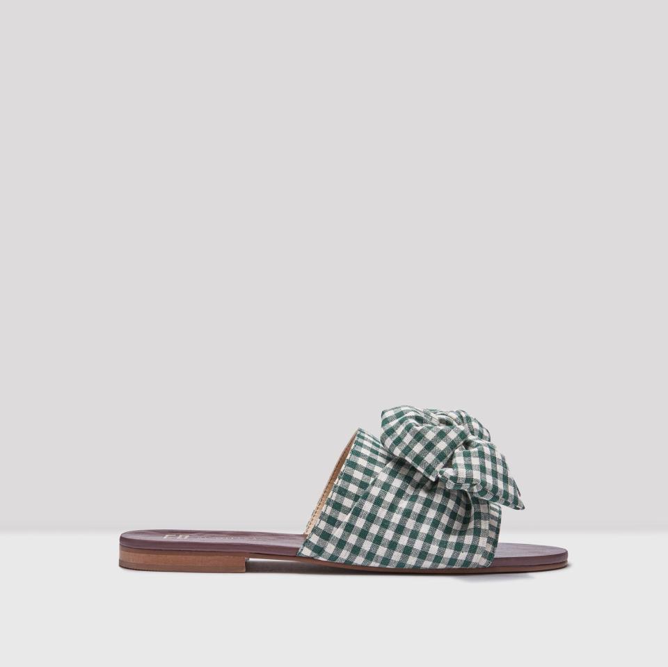 <p><span>Our love for gingham isn’t going anywhere fast and these sandals simply scream summer. </span><br><em><a rel="nofollow noopener" href="https://miista.com/collections/e8-sandals/products/peggy-dark-green-gingham-sandals" target="_blank" data-ylk="slk:Buy here.;elm:context_link;itc:0" class="link "><span>Buy here.</span></a></em><br><br></p>
