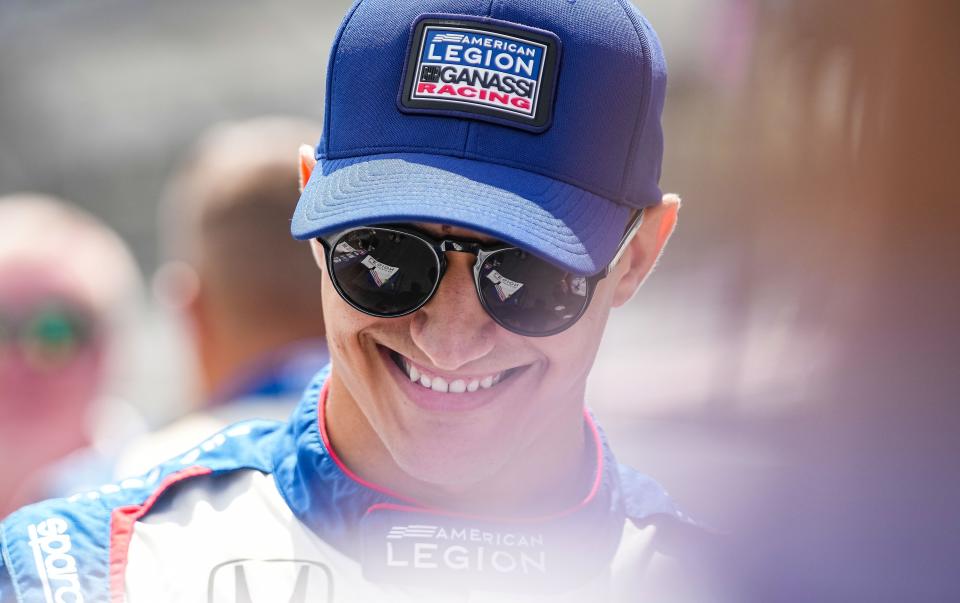 Chip Ganassi Racing driver Álex Palou (10) walks out to pit lane Saturday, Aug. 12, 2023, ahead of the Gallagher Grand Prix at the Indianapolis Motor Speedway in Indianapolis. 