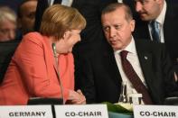 German Chancellor Angela Merkel (left) shakes hands with Turkish President Recep Tayyip Erdogan during the World Humanitarian Summit in Istanbul in May 2016