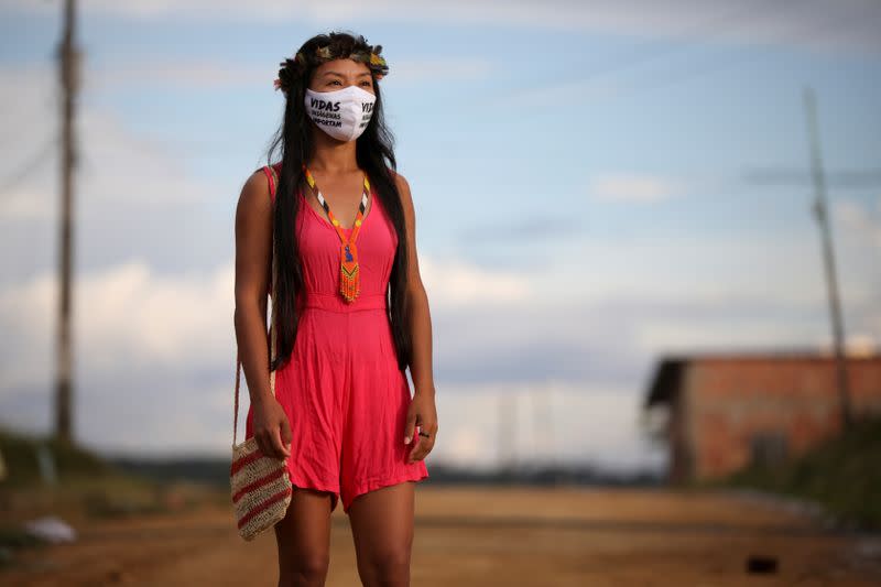 The Wider Image: In the Amazon, an indigenous nurse volunteers in coronavirus fight