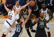 Jun 3, 2018; Oakland, CA, USA; Cleveland Cavaliers forward Larry Nance Jr. (22) defends against Golden State Warriors guard Stephen Curry (30) during the second half in game two of the 2018 NBA Finals at Oracle Arena. Kelley L Cox-USA TODAY Sports