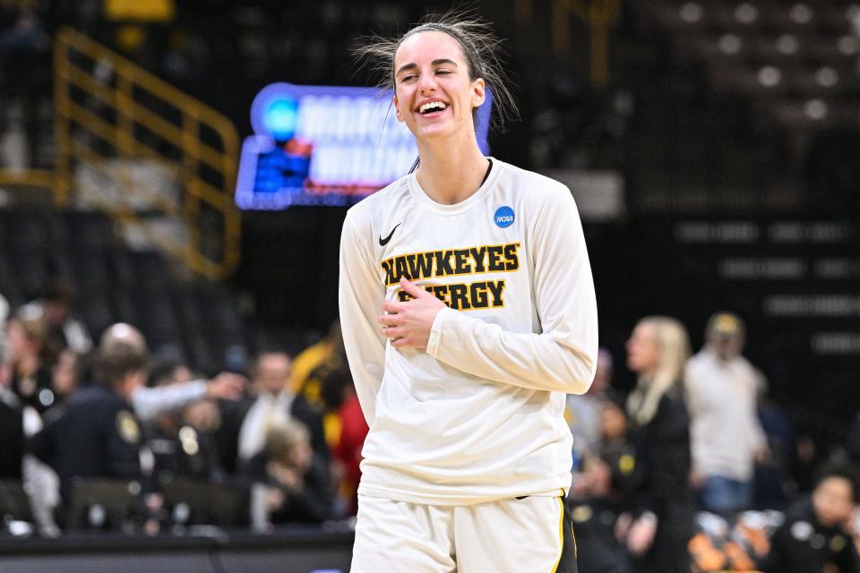 Iowa Hawkeyes guard Caitlin Clark (22) warms up before the NCAA Tournament first-round game against Holy Cross.