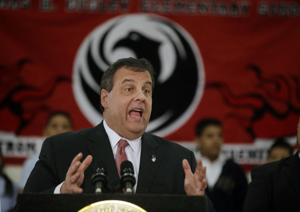 New Jersey Gov. Chris Christie addresses a gathering at the Dudley Family School Thursday, Jan. 23, 2014, in Camden, N.J. Gov. Christie praised a new pilot program that is offering free hot dinners to students in a half-dozen Camden schools. The program is now serving between 75 and 125 students at each location where it's operating. (AP Photo/Mel Evans)