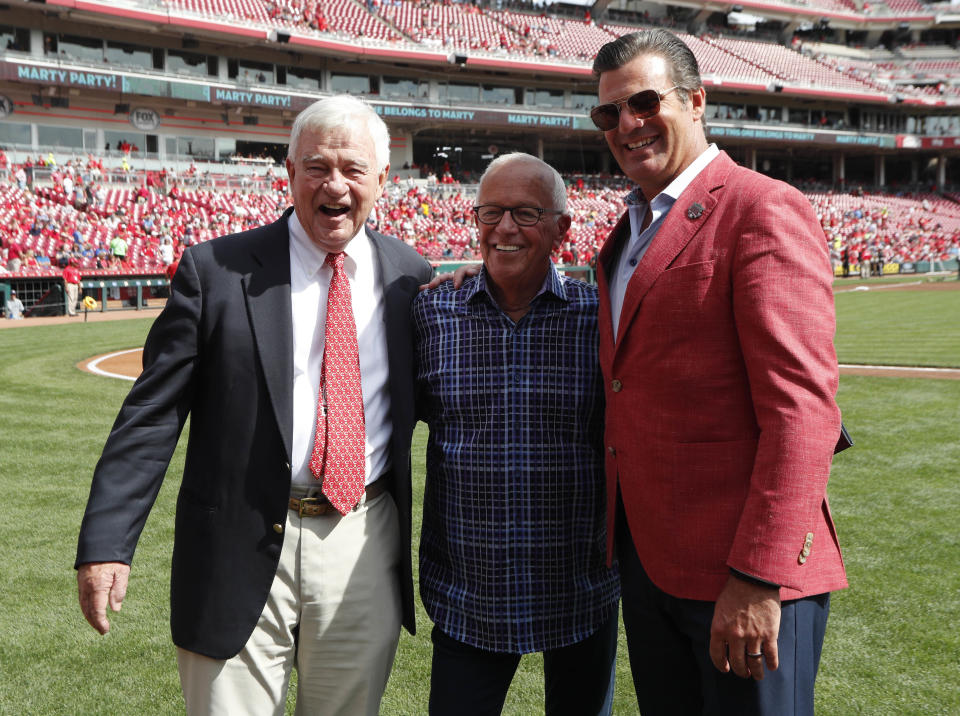 Sep 26, 2019; Cincinnati, OH, USA; Cincinnati Reds radio announcer Marty Brennaman (middle) stands with Reds owner Bob Castellini (left) and Phil Castellini (right) before a game between the Milwaukee Brewers and the Cincinnati Reds at Great American Ball Park. Brennaman is retiring after 46 years. Mandatory Credit: David Kohl-USA TODAY Sports